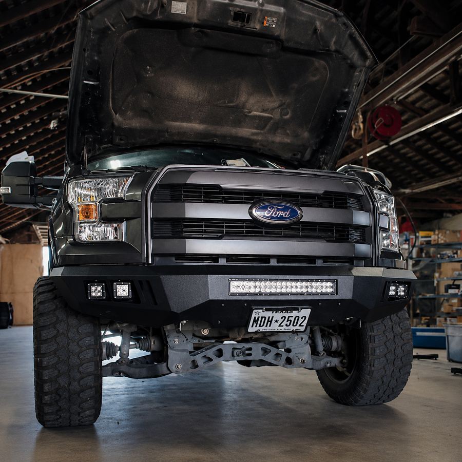 Front replacement bumper with light bar on a Ford